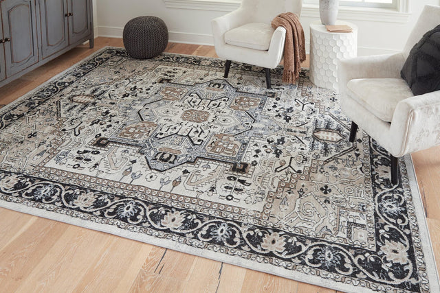Gregmoore Multi 7'7" X 9'11" Rug - Ella Furniture