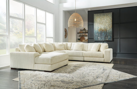 Lindyn Ivory 5-Piece Sectional With Ottoman - Ella Furniture