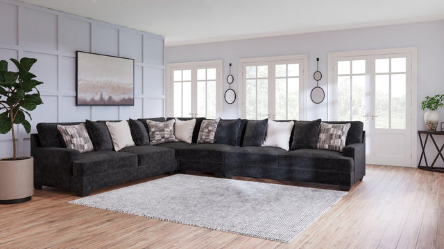 Lavernett Charcoal 4-Piece Sectional With Ottoman - Ella Furniture