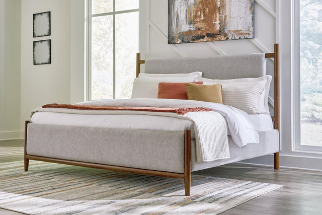 Lyncott Brown Queen Upholstered Panel Bed - Ella Furniture