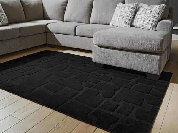 Gibbswell Black Washable 5' x 7' Area Rug