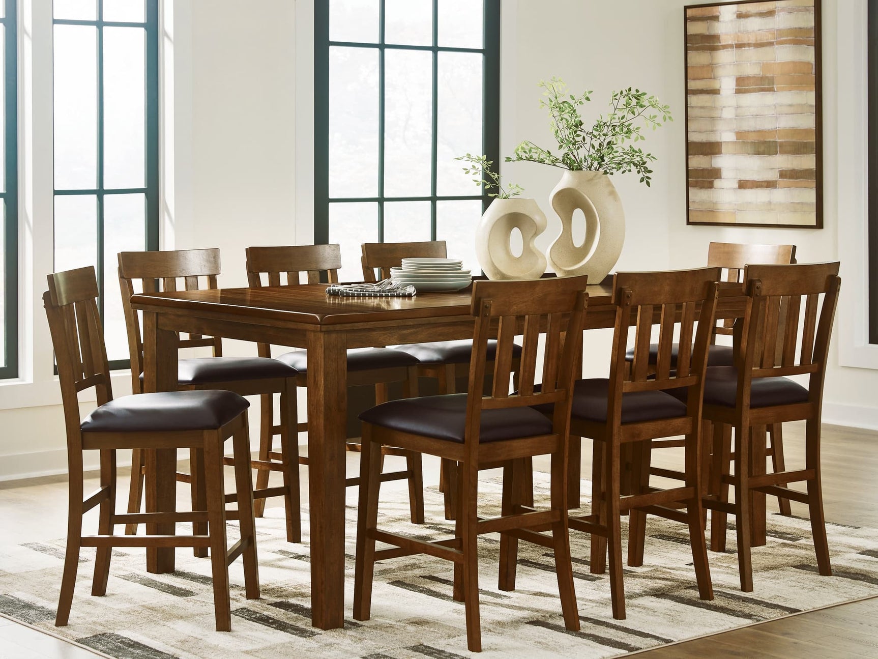 Ralene Medium Brown Counter Height Dining Table and 8 Barstools