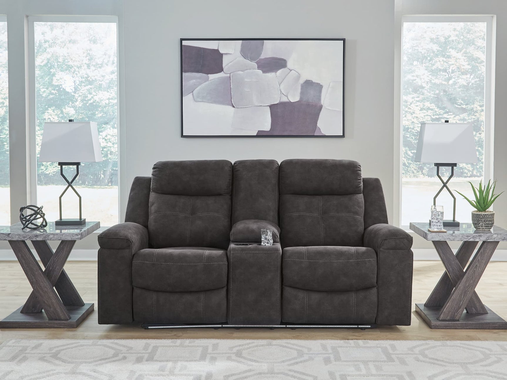 Brysonview Charcoal Faux Leather Reclining Loveseat with Console