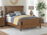 Rowlenstown Brown Queen Poster Bed