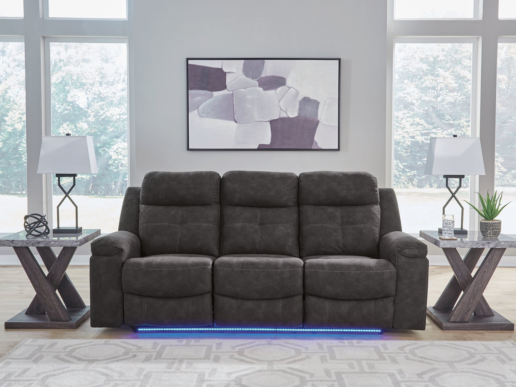 Brysonview Charcoal Faux Leather Reclining Sofa
