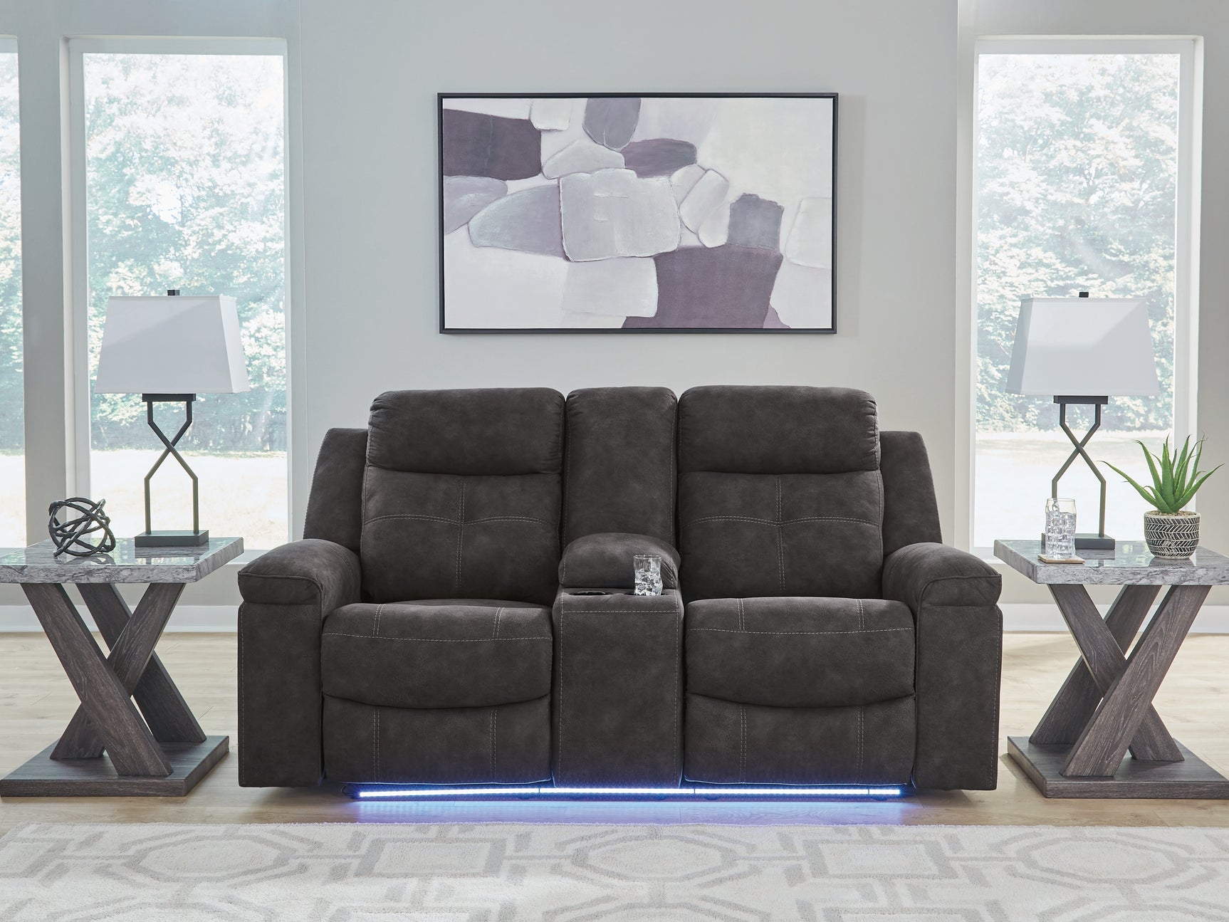 Brysonview Charcoal Faux Leather Reclining Loveseat with Console