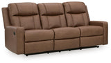 Mackmenville Caramel Faux Leather Reclining Sofa angled view