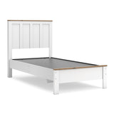 Kerisden White/Brown Twin Panel Complete Bed Frame — angled view