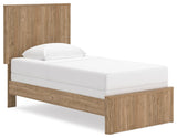 Gramburg Warm Natural Brown Twin Panel Bed angled view