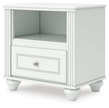 Kozlani White Upholstered Panel Storage Bedroom Set angled view
