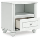 Kozlani White Upholstered Panel Storage Bedroom Set angled view