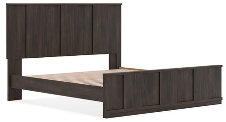 Shaehartin Dark Brown King Panel Platform Bed angled view