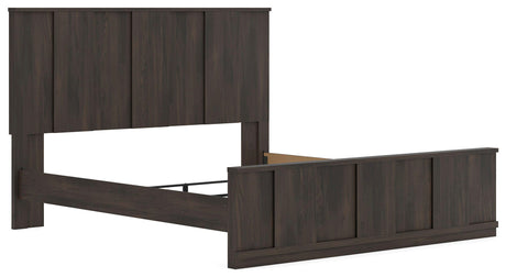 Shaehartin Dark Brown King Panel Bed angled view