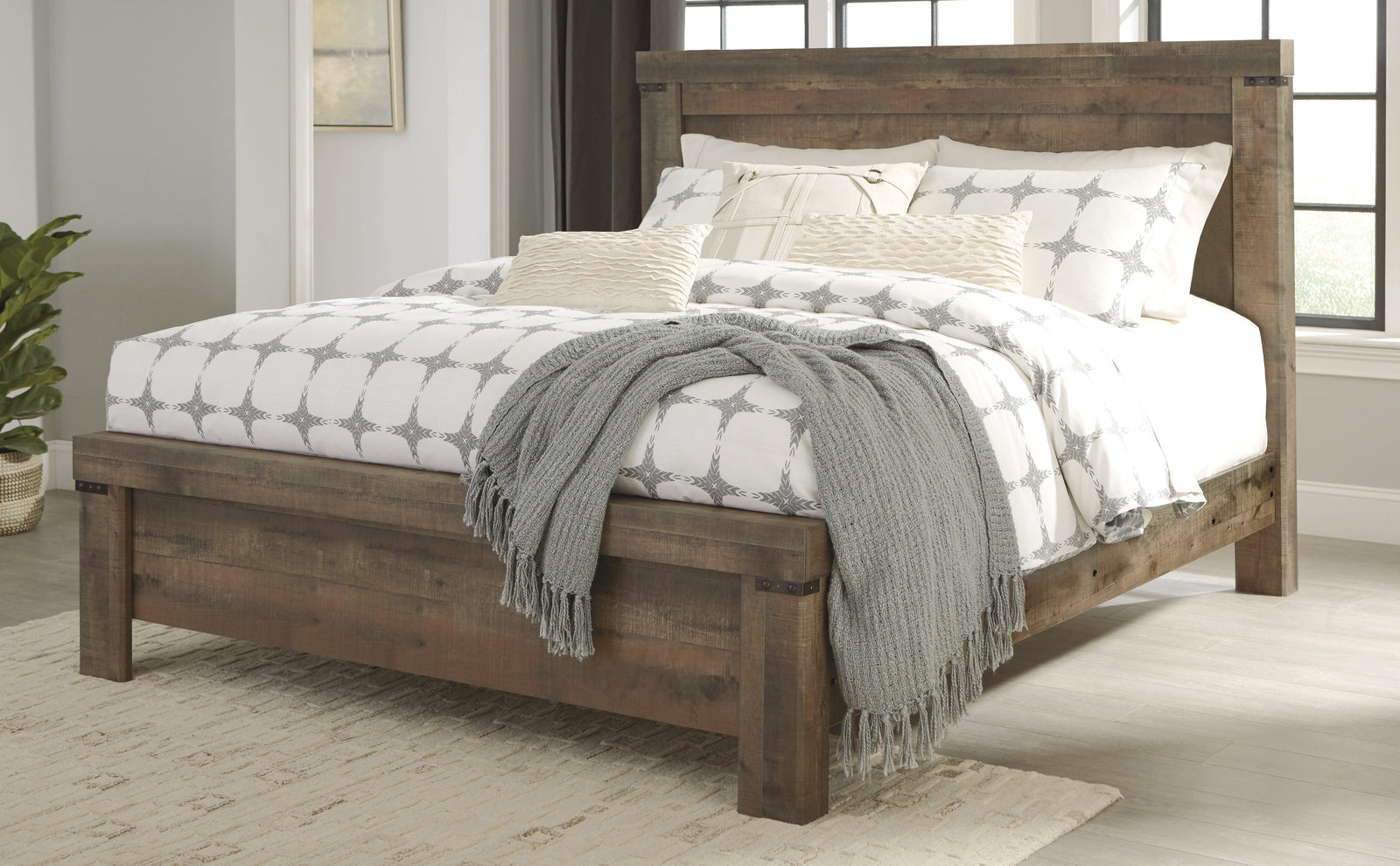 Trinell Brown King Panel Bed - Ella Furniture