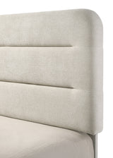 Nyomi White Upholstered Panel King Bed