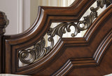 Lavinton Brown Queen Poster Bed with Ornate Headboard
