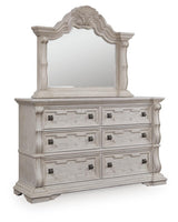 Bruchandi Antique White Upholstered Panel Bedroom Set angled view