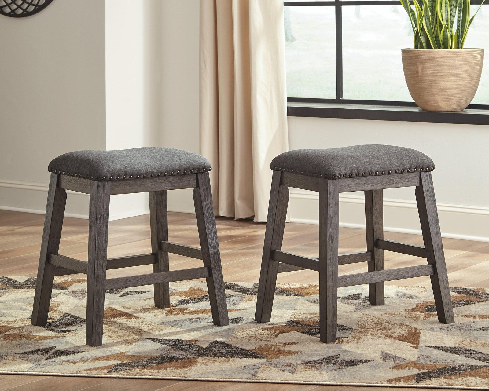 Caitbrook Gray Counter Height Upholstered Bar Stool D388-024 - Ella Furniture