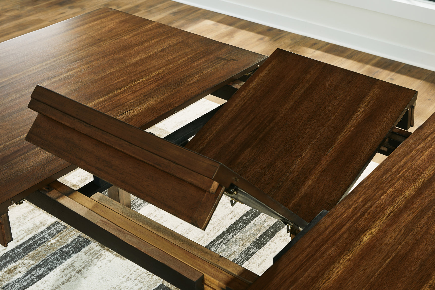 Ralene Medium Brown Counter Height Dining Extension Table