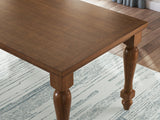 Greddinton Brown Counter Height Dining Table and 4 Barstools