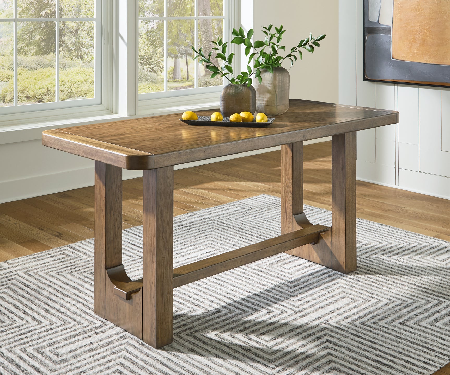 Cabalynn Light Brown Counter Height Dining Table and 4 Barstools with Storage