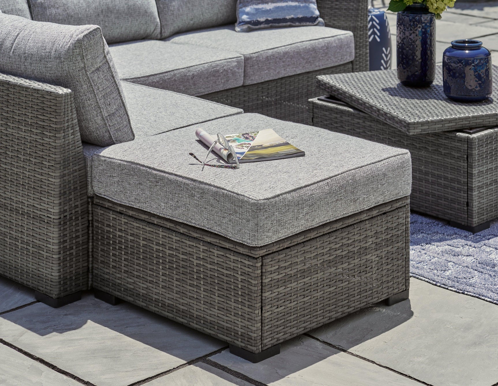 Petal Road Gray Outdoor Loveseat Sectional Set with Ottoman and Storage Table - Set of 4