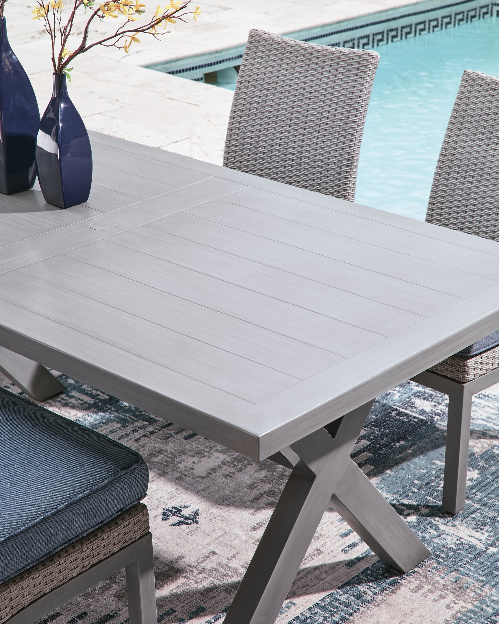 Half Gray Moon Beach Outdoor Dining Table and 6 Chairs
