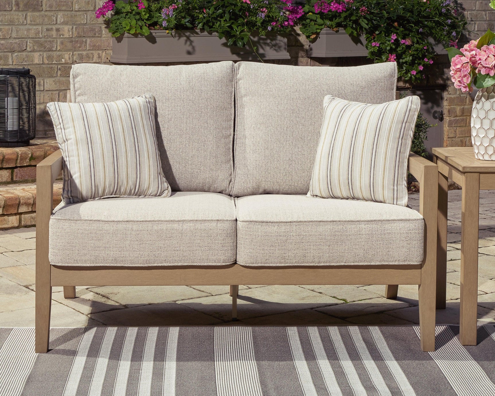 Hallow Creek Driftwood Outdoor Loveseat With Cushion