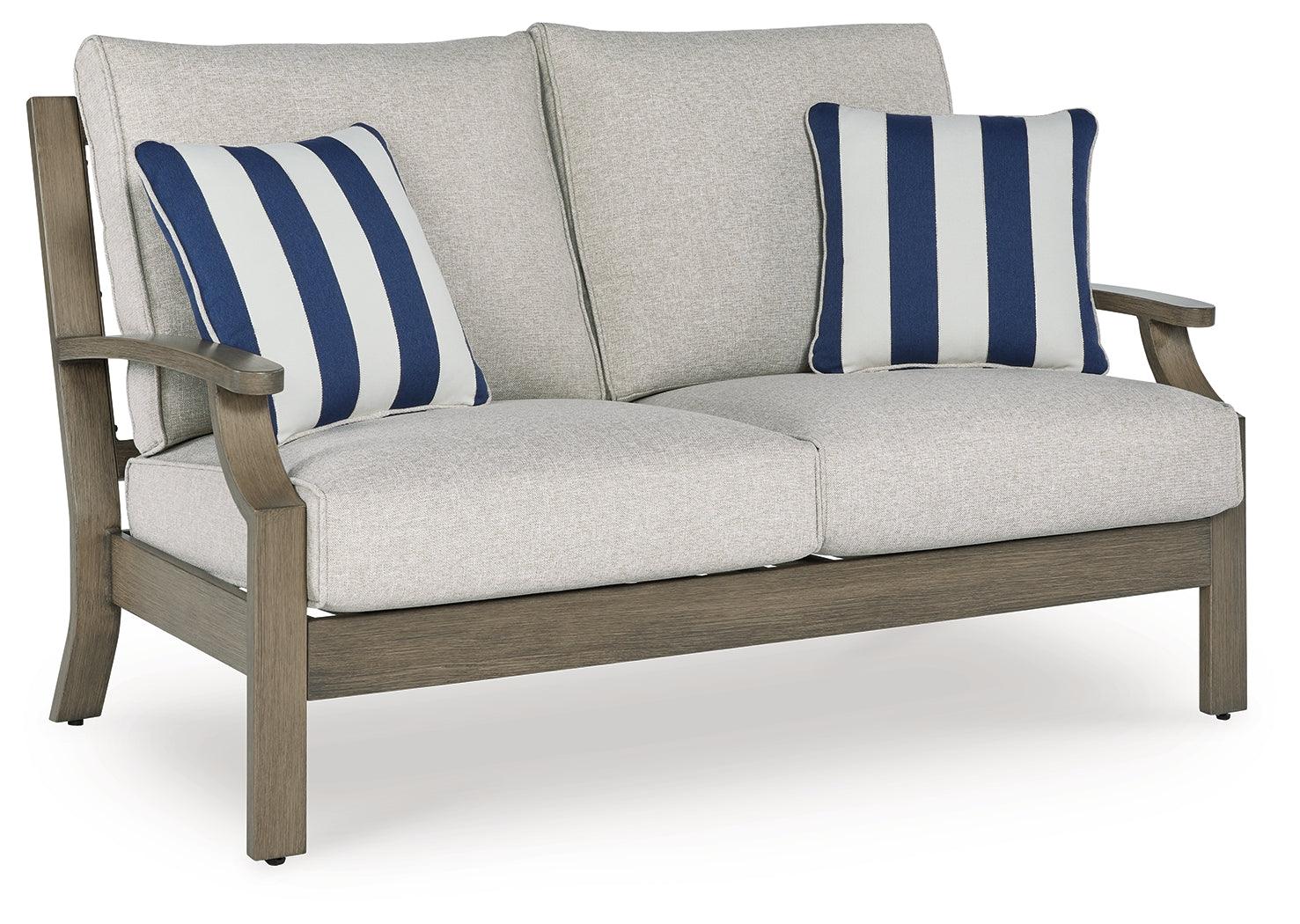 Rainier Ranch Brown/Beige Nuvella® Outdoor Loveseat with Cushion