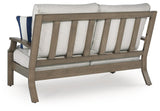 Rainier Ranch Brown/Beige Nuvella® Outdoor Loveseat with Cushion