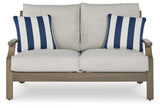 Rainier Ranch Brown/Beige Nuvella® Outdoor Loveseat with Cushion