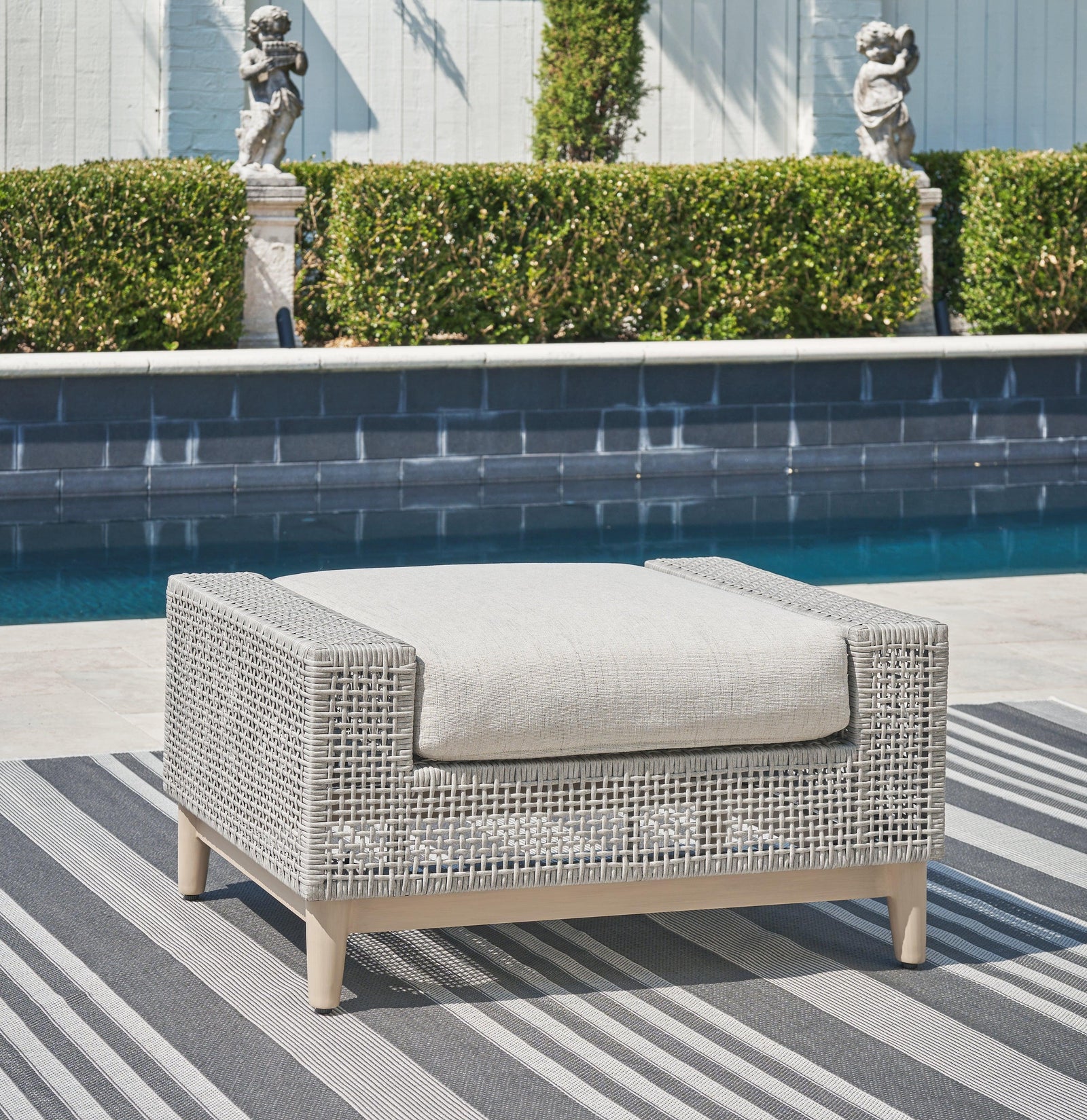 Seton Creek Gray Outdoor Ottoman With Cushion - Ella Furniture