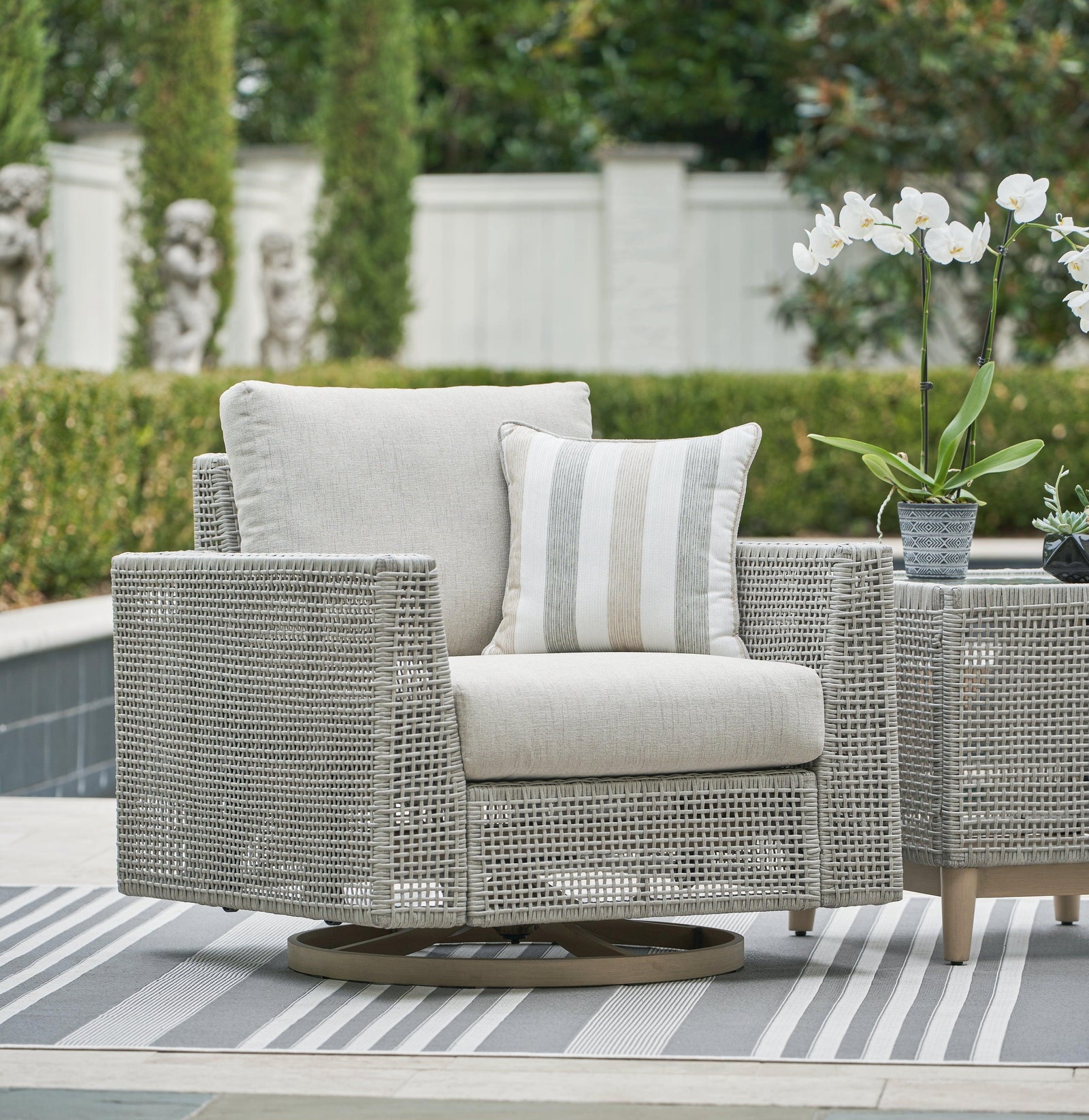 Seton Creek Gray Outdoor Swivel Lounge With Cushion - Ella Furniture