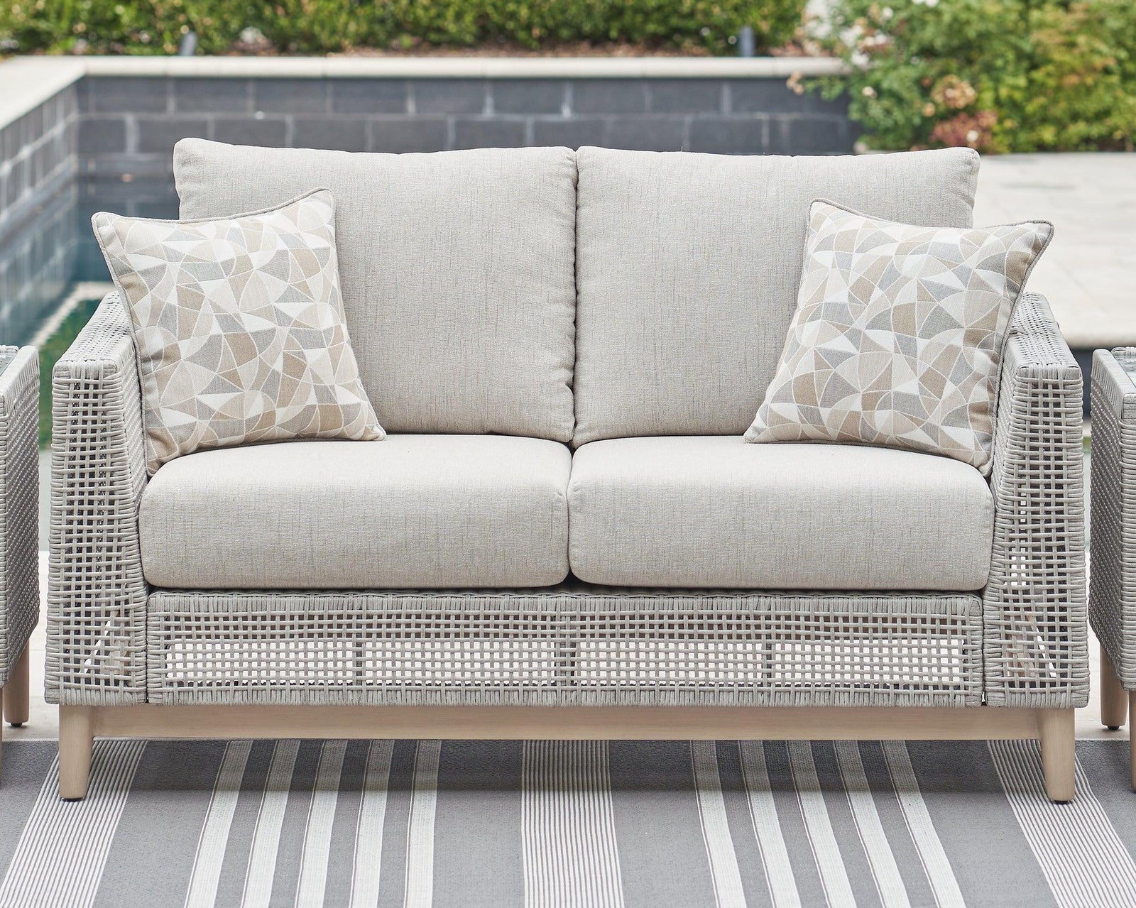 Seton Creek Gray Outdoor Loveseat With Cushion - Ella Furniture