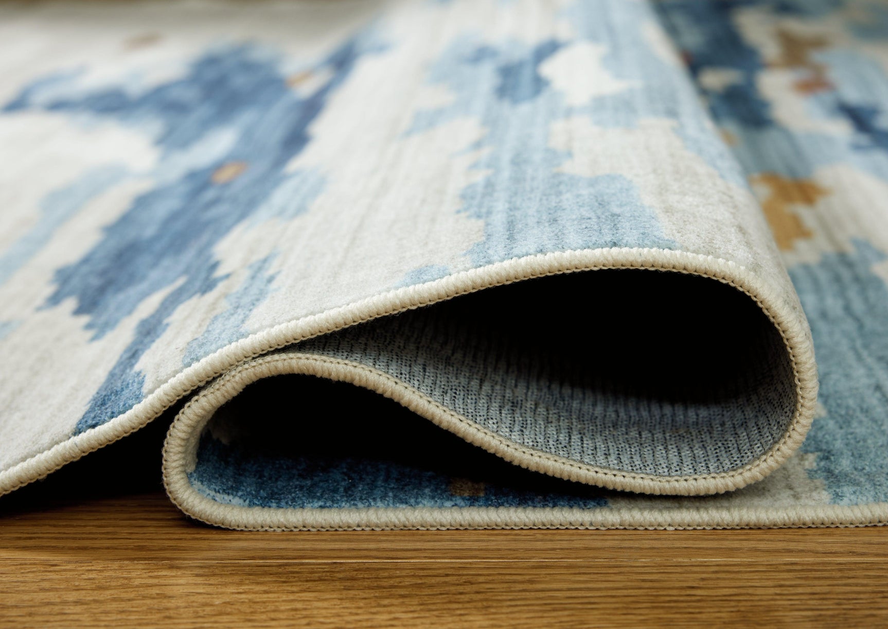 Vinlett Cream/Blue/Brown 5' x 7' Washable Rug