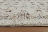 Jossler Ivory/Brown/Teal 5' x 7' Rug