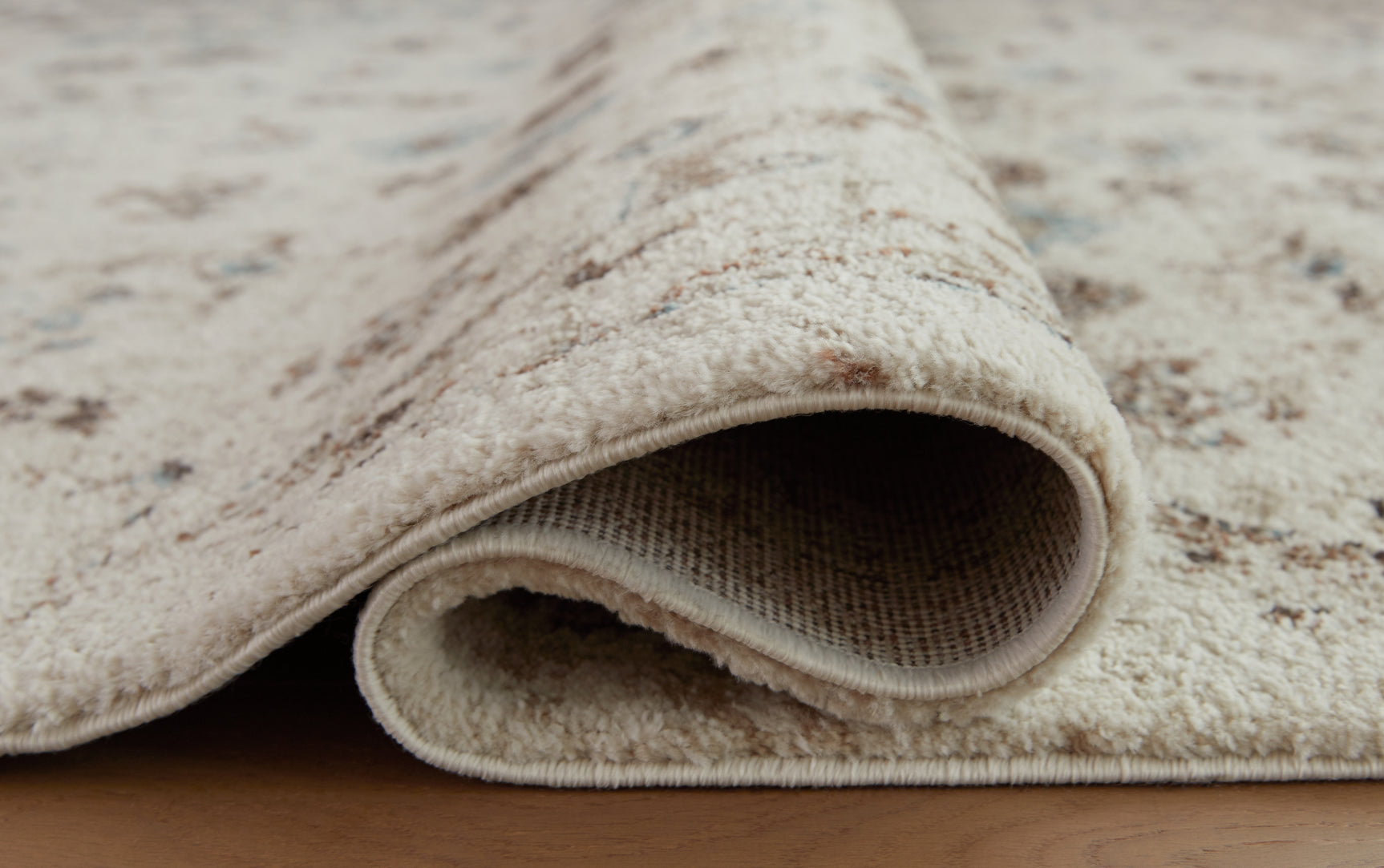 Jossler Ivory/Brown/Teal 5' x 7' Rug