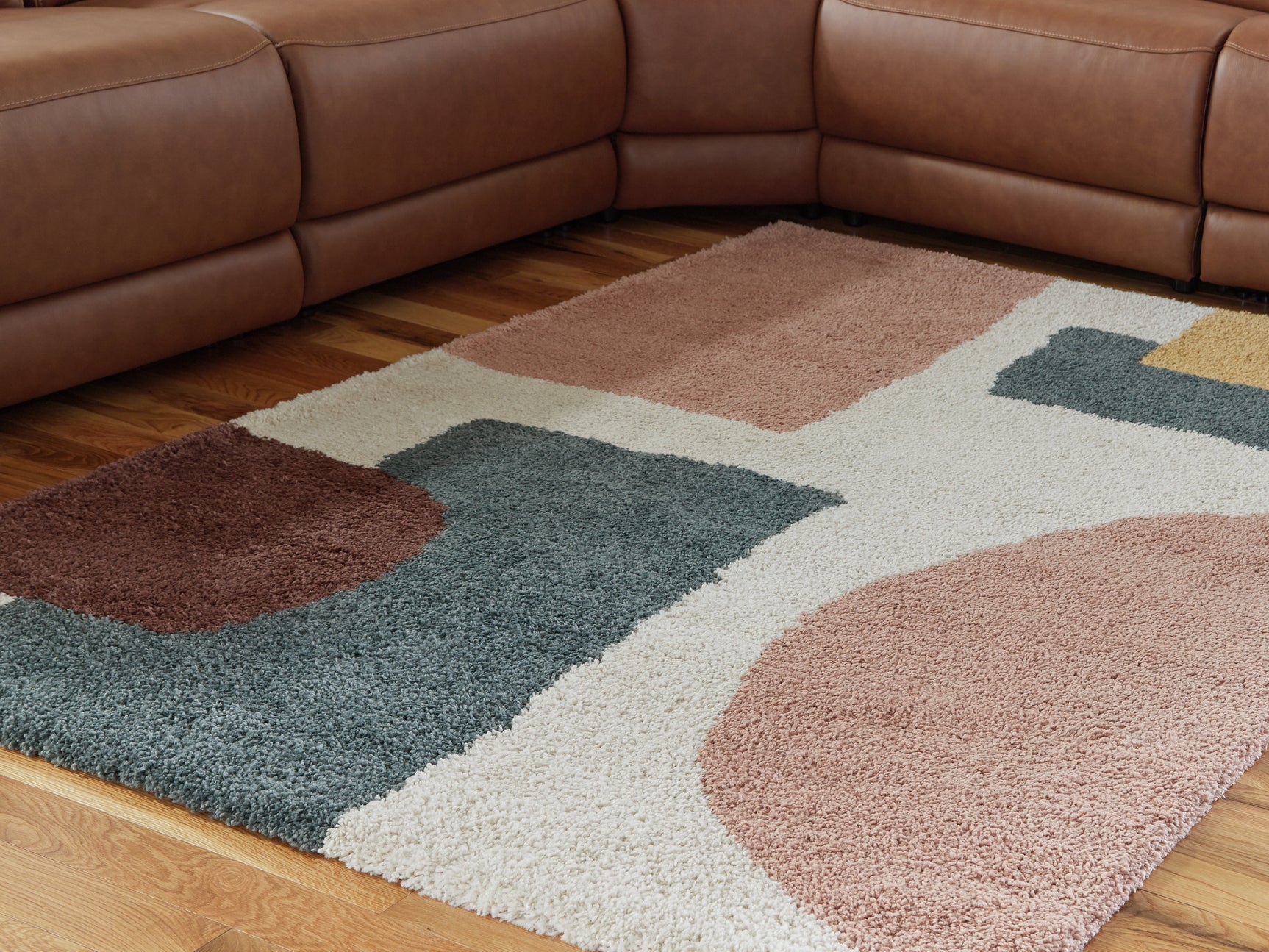 Flynnwick Cream/Pink/Gray 8' x 10' Rug