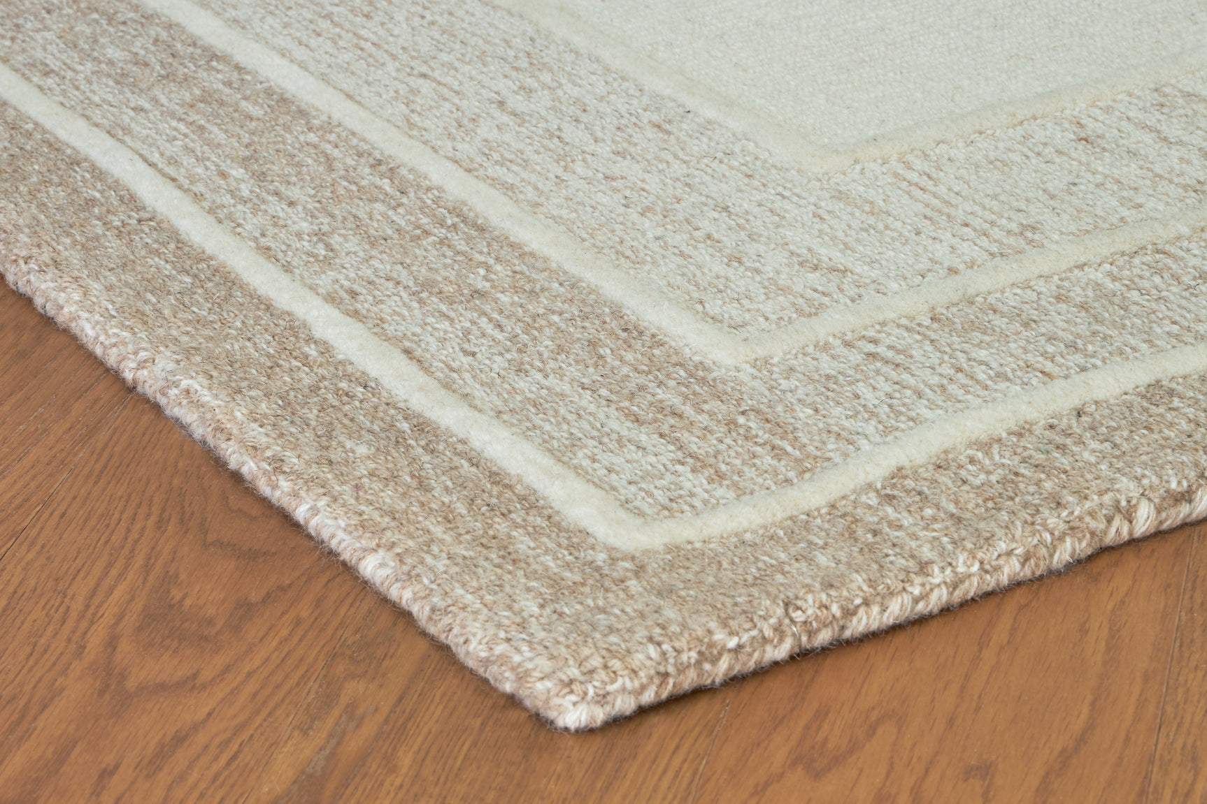 Teelgan Ivory/Tan Large Rug