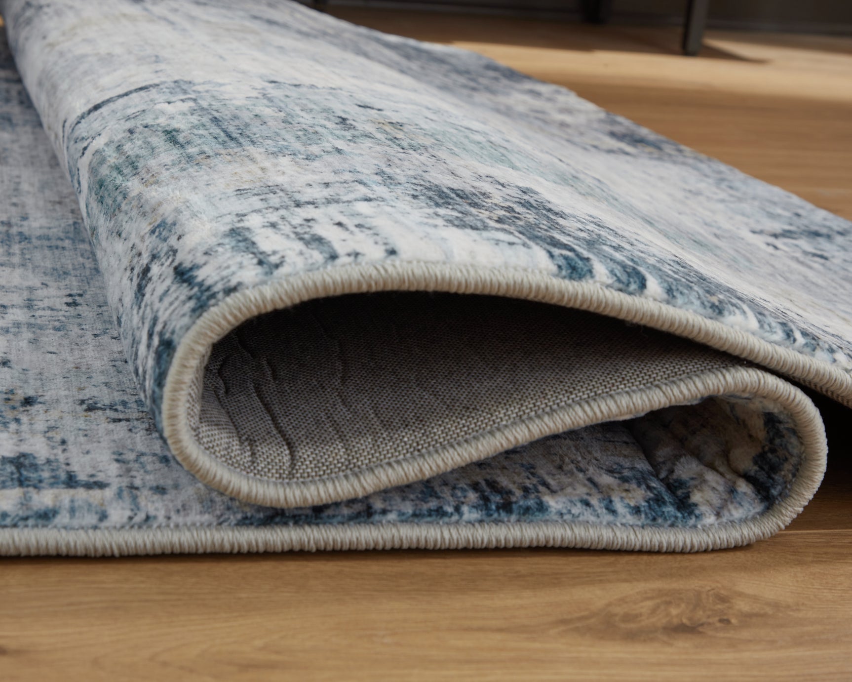 Arlenmont Blue/White/Brown 7'6" X 9'6" Memory Foam Area Rug