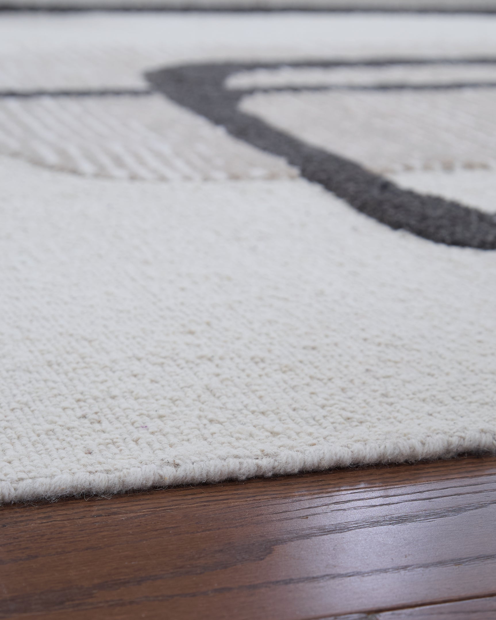 Davismour Ivory/Taupe/Charcoal 5' x 7' Area Rug