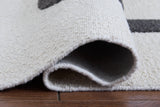 Davismour Ivory/Taupe/Charcoal 5' x 7' Area Rug