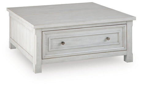 Robbinsdale Antique White Lift-Top Coffee Table angled view
