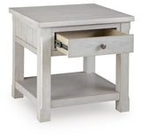 Robbinsdale Antique White End Table angled view