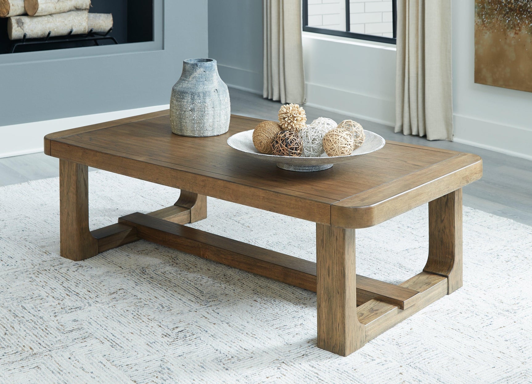 Cabalynn Light Brown Coffee Table - Ella Furniture