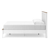 Kerisden White/Brown Queen Panel Complete Bed Frame — side view