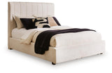 Brizmore Beige Queen Upholstered Storage Bed — angled view