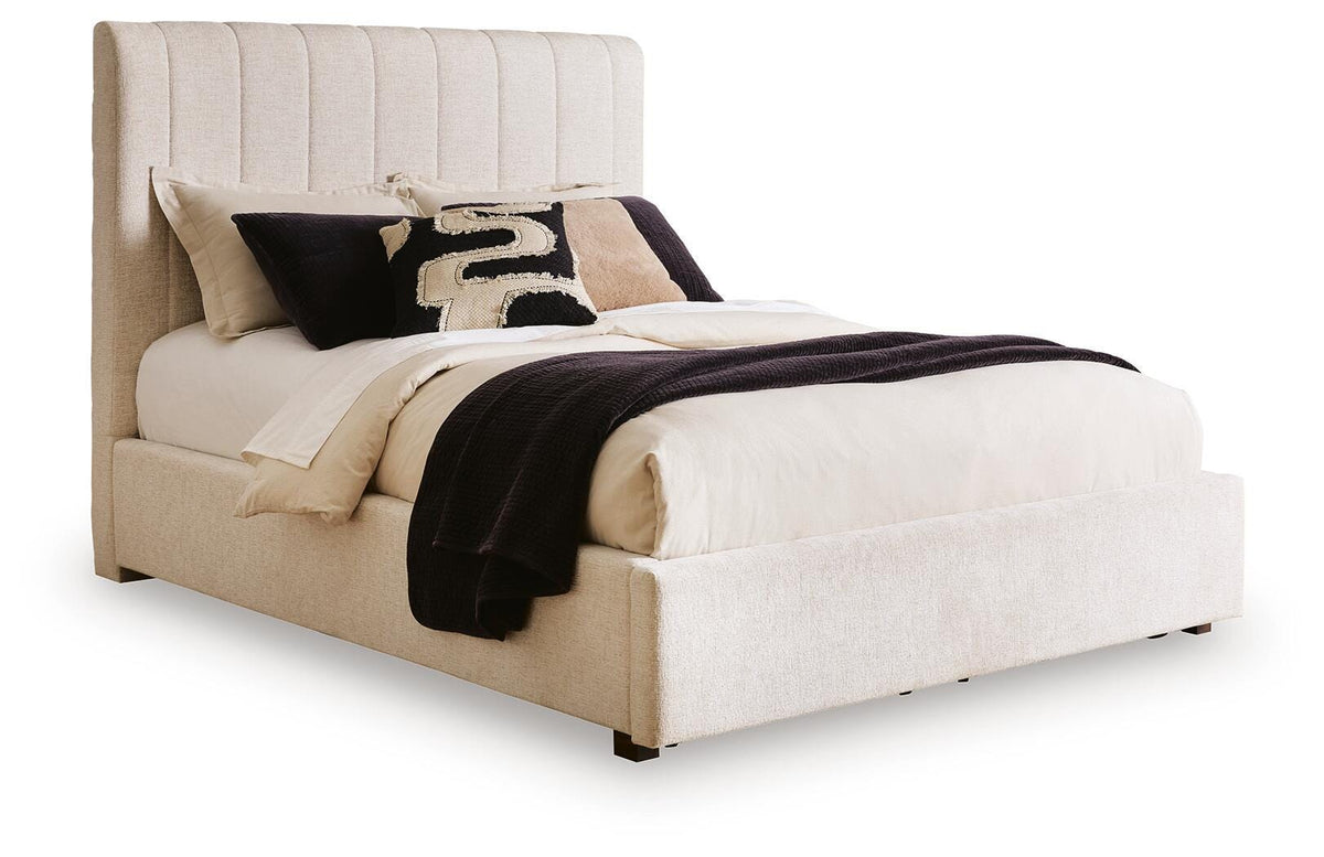 Brizmore Beige Queen Upholstered Storage Bed — angled view