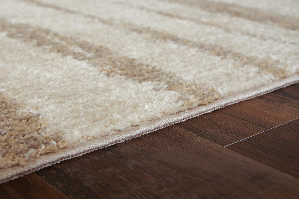 Jerrlow Beige/Brown/Gray Washable Medium Rug — detail view