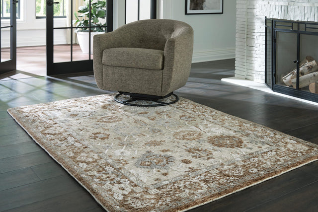 Ainswick Brown/Beige/Gray Memory Foam Medium Rug from Ella Furniture